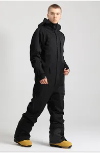 Detail view of black men's ski jumpsuit with adjustable velcro cuffs and zip pocket