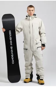 Detail of waterproof one-piece ski suit with cargo pockets and integrated hood