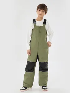 Salopette da sci per bambini verde impermeabile con spalline e strisce riflettenti