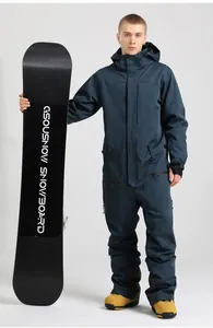Detail view of a men's waterproof navy blue one-piece ski suit with pockets and hood