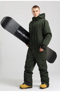 Detail view of a men's waterproof green one-piece ski suit with pockets and a hood