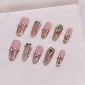 Luxurious French champagne gold cat eye press-on nails with rhinestones and pearls
