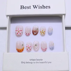 3D handmade floral press-on nails set with pink relief and blue gradient in a gift box