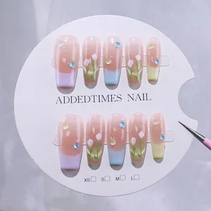 French handmade press-on nails with hand-painted macaron tulips and cat-eye finish