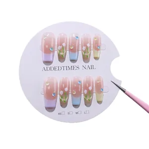 Handmade press-on nails with macaron gradient colors and hand-painted tulip flower art