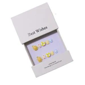 Kids press-on nails set with cute yellow turtle and summer elements in a gift box