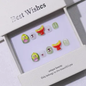 Handmade press-on nails for kids with cute cartoon motifs and elegant gift box