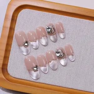 Handmade French cat eye press-on nails set with crystals and metal butterfly charms