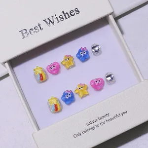 Handmade dopamine cartoon press-on nails set with glitter and star patterns in a gift box