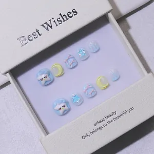 Handmade 3D cartoon press-on nails for kids with cute star and bow designs in gift box