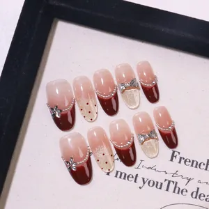 Handmade wine red French bow press-on nails with 3D flower and pearl chain accents