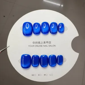 Deep blue cat eye press-on nails with shimmering magnetic line effect in square-oval shape