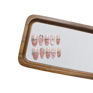 Faux ongles dégradés blush de luxe avec fleurs 3D et accents de diamants