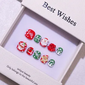Coffret de faux ongles de Noël faits main avec motifs 3D Père Noël et bonhomme de neige