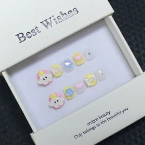 Handmade 3D cartoon press-on nails for kids with cute clouds and stars in a gift box