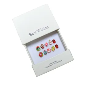 Handmade 3D Christmas press-on nail kit for kids with cute reindeer and snowman motifs