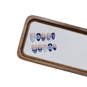 Handmade 10pcs blue almond fake nails with 3D floral carving and marble gradient pattern