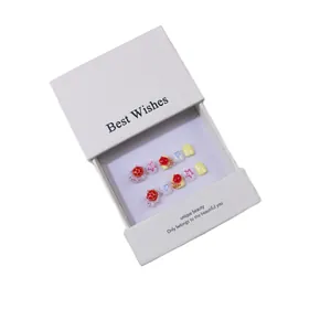 Handmade kids press-on nail kit with 3D ladybug and star designs in white gift box