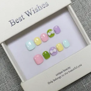Handmade 3D bow macaron color short round press-on nails set for kids and girls