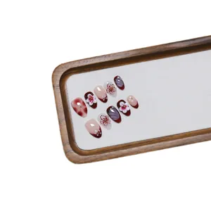 Handmade 10pcs 3D floral press-on nails in burgundy and nude pink with cat eye finish