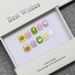 Handmade macaron colorful press-on nails for kids with 3D bee and butterfly charms