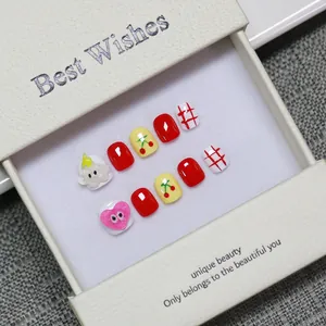 Handmade kids press-on nails set with cherry and heart patterns in a white gift box
