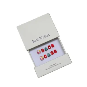 Handmade Christmas press-on nails set with Santa and 3D tree design in a gift box
