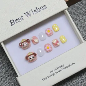 Handmade 3D cartoon press-on nails for kids with cute monkey and floral art, 10-piece set