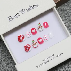 Faux ongles 3D de Noël faits main avec bonhomme de neige et gants rouges en boîte cadeau