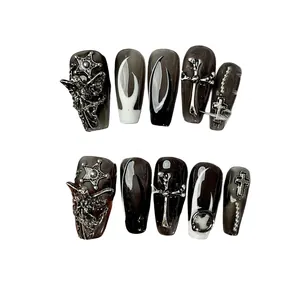 Dark Gothic handmade press-on nails with 3D silver angel, cross, and star charms