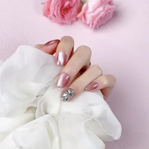 Faux ongles œil de chat rose avec strass de luxe et paillettes argentées