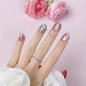 Faux ongles faits main œil de chat rose avec paillettes et strass de luxe brillants