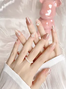 Détails de faux ongles sirène en poudre d'aurore avec perles et texture œil de chat