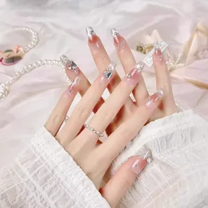 Handmade coffin press-on nails with silver cat-eye effect and sparkling rhinestones