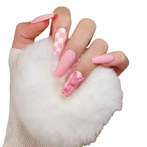 Pink matte press-on nails in long coffin shape with 3D bunny and checkerboard pattern
