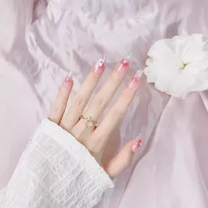 Pink gradient long coffin press-on nails with 3D floral accents and glitter details
