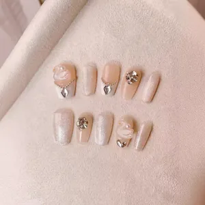 Handmade press-on nails set with 3D white swan, pearls and champagne cat-eye glitter