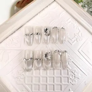 Luxury handmade silver cat-eye press-on nails with 3D rhinestones in coffin shape