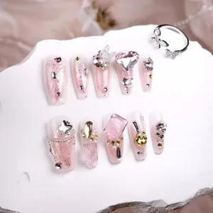 Pink glitter press-on nails with 3D butterflies, sparkling rhinestones and matching ring