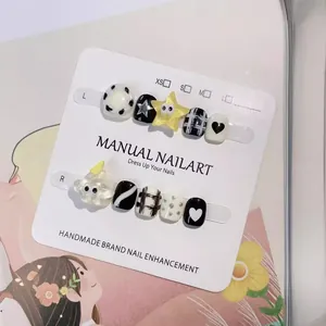 Uñas postizas artesanales para niños con patrones de vaca y estrellas doradas 3D