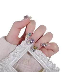 Sparkling long handmade press-on nails with 3D colorful crystals and butterfly charms