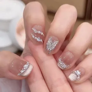 Handmade press-on nails with cat eye effect, 3D butterfly, pearls and rhinestones