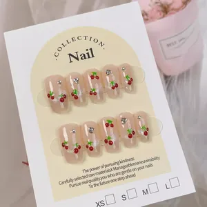 Handgefertigte Künstliche Nägel Zum Aufkleben Kirschmuster Katzenauge Sargform Strass Glitzer Rosa Nude Kurz Damen Maniküre