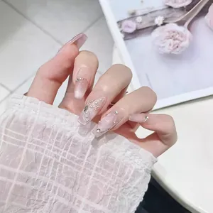 Pink and purple gradient press-on nails with 3D butterfly, pearls and rhinestone accents