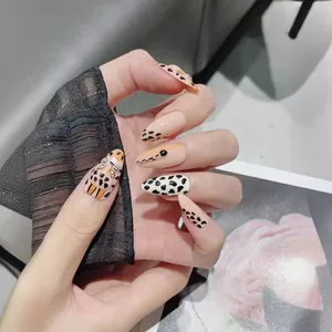 Handmade leopard print almond press-on nails with 3D tiger pattern for high-fashion styling