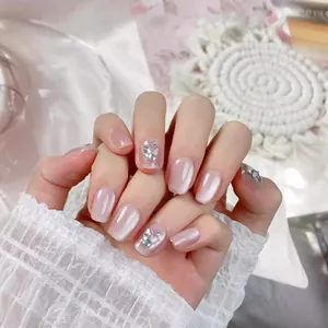 Handmade short square cat-eye press-on nails with silver 3D butterflies and rhinestones
