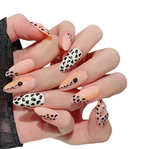 Handmade almond press-on nails with leopard print and nude pink chic animal patterns