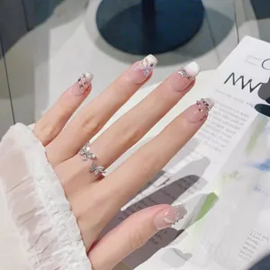 Handmade butterfly cat-eye press-on nails with 3D gradient pink finish and rhinestones