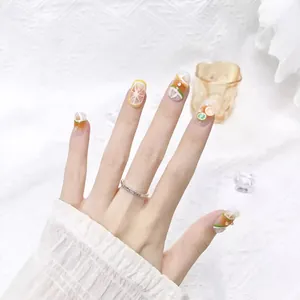 Handmade fruit press-on nails with orange and lime slices, long square summer manicure