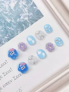 Detail of 10pcs blue sea style handmade press-on nails for kids with 3D star and bow charms